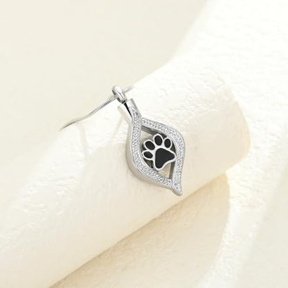 The Eye of My Heart Paw Print Urn Necklace for Ashes | stainless steel cremation jewelry, holds pet human ashes, paw print memorial urn pendant, leak-proof sealed design, unisex - color: Silver