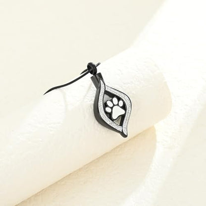 The Eye of My Heart Paw Print Urn Necklace for Ashes | stainless steel cremation jewelry, holds pet human ashes, paw print memorial urn pendant, leak-proof sealed design, unisex - color: Black