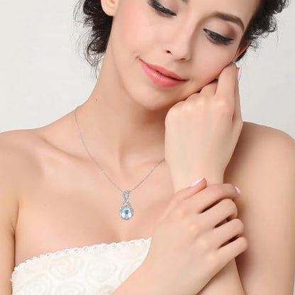 ZOEXUE Infinity Cross Cremation Jewelry - S925 Sterling Silver Cross Urn Necklace for Women - Birthstone Cross with Heart CZ Ashes Keepsake Pendant Memorial Urn Jewelry Gift for A Loss Loved Ones - color: blue
