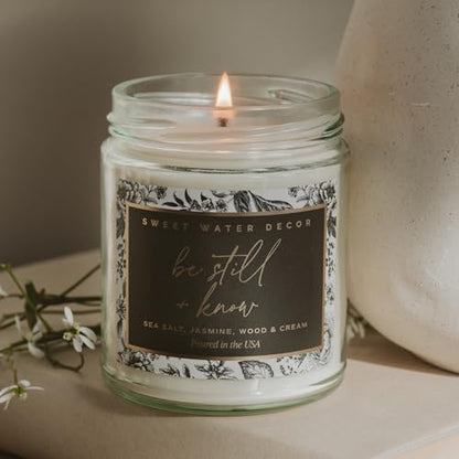 Sweet Water Decor Be Still and Know Candle, Sea Salt, Jasmine Cream, and Wood Scented Soy Wax Candle for Home, Christian Gift for Women, 9oz Clear Jar, 40 Hour Burn Time, Made in the USA - style: Be Still and Know - Black Label