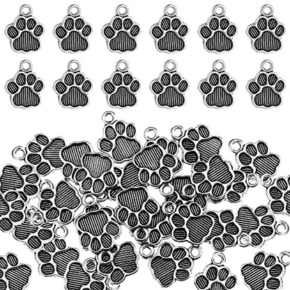 Junkin 120 Pieces Dog Paw Print Charms Animal Footprint Pendants 15x12 mm Metal Puppy Prints Charms for Jewelry Making DIY Necklace Bracelet(Ancient Silver)